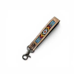 Light Blue Aztec Tooled Leather a wrist Strap